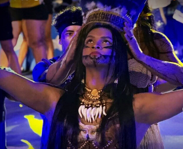 Primeira mulher trans do festival, Lup Moara fará sua estreia como item tuxaua no festival deste ano.